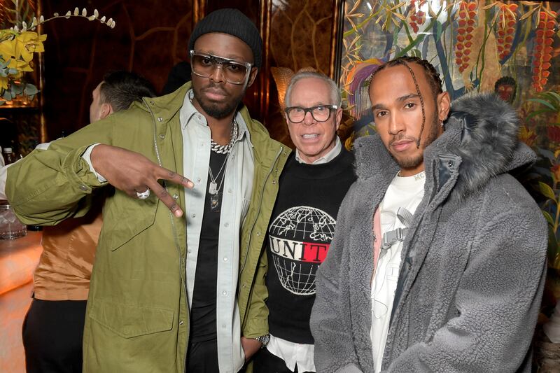 Tommy Hilfiger with the French singer Dadju and multiple world champions Formula 1 driver Lewis Hamilton at a TOMMYNOW after party in London in 2020. Photograph: David M. Benett/Dave Benett/Getty Images for Tommy Hilfiger