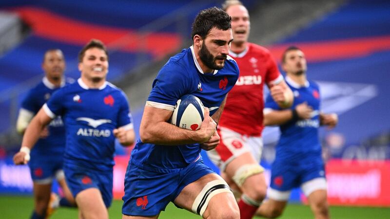 Flanker Charles Ollivon runs in a try during the game against Wales at Stade de France. Photograph: Anne-Christine Poujoulat/AFP via Getty Images