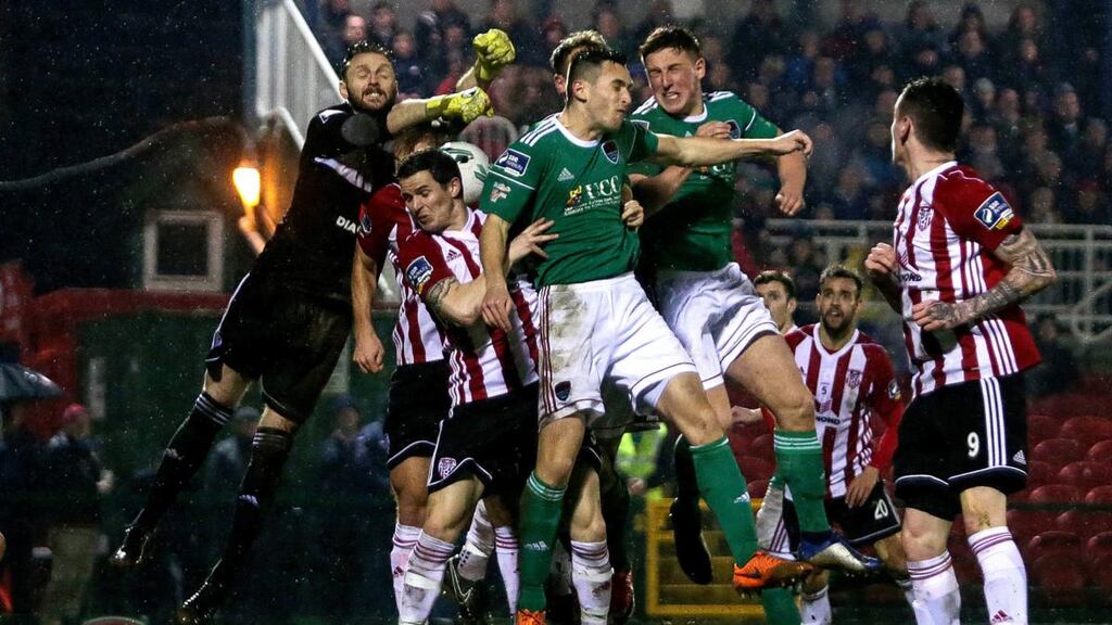 Cork City Mark McNulty tries to fist a corner away against Derry City. Photograph: Laszlo Geczo/Inpho