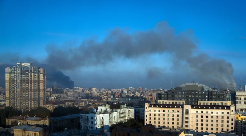 Smoke billows over the city after Russian strikes hit central Kyiv, Ukraine. Photograph: Sergey Dolzhenko / EPA