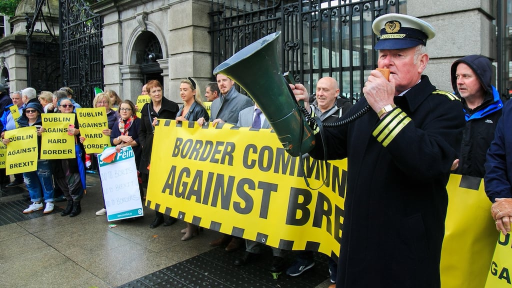 Protester Seamus McDonnell dressed as a Customs official during a rally organised by Border Communities against Brexit on Monday. Photograph: Gareth Chaney/Collins
