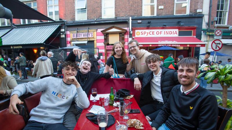 Matthew Norman (right) and friends from Meath on South William Street in Dublin. Photograph: Gary Ashe