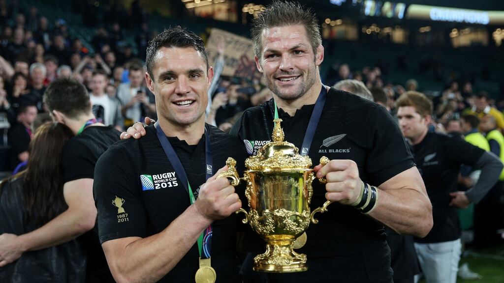 Dan Carter and Richie McCaw with the Webb Ellis Cup. Photograph: PA