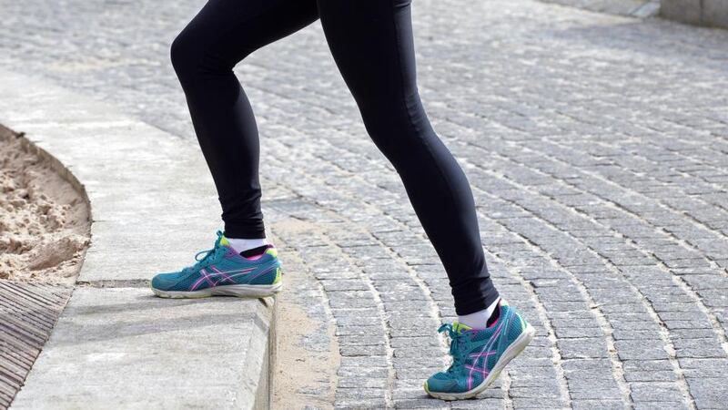 Mary Jennings stretches out with the step-up exercise. Photograph: Eric Luke