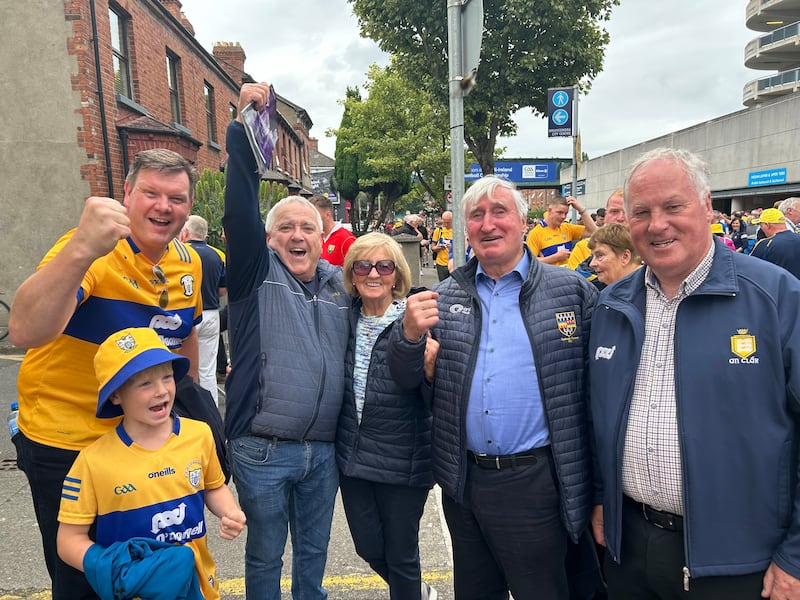 Clare fans Donal Lawlor with raised fist, Len Gaylor second from right after the All Ireland hurling final