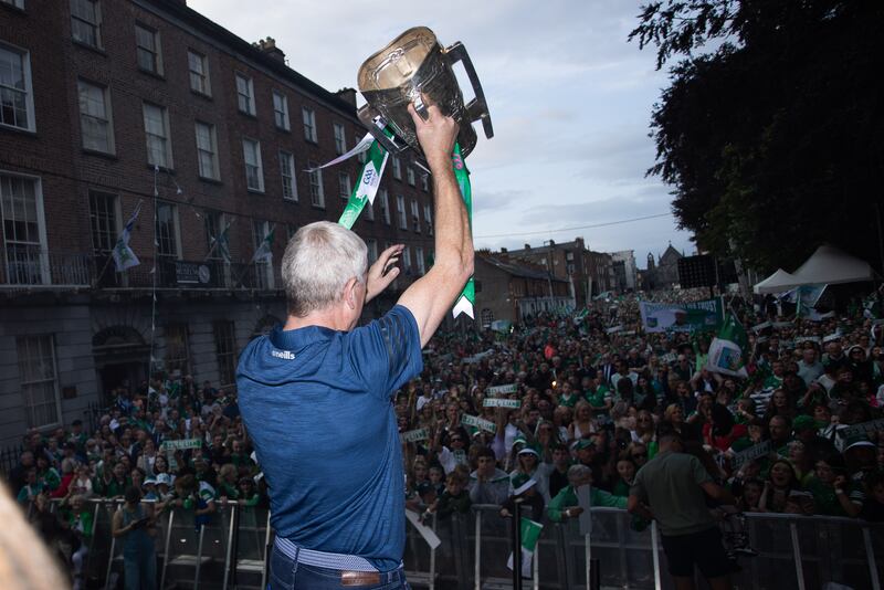 John Kiely lifts the Liam McCarthy Cup to the fans. Photograph: Tom Maher/Inpho