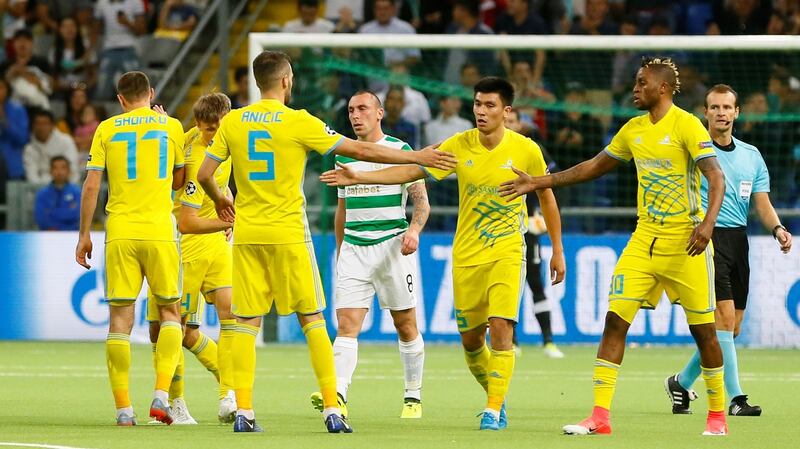 FC Astana players celebrate after scoring against Celtic. Photograph: Reuters