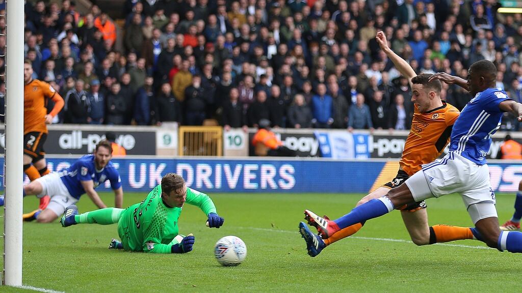 Diogo Jota scores Wolves’ first goal of the game during the Championship match against Birmingham City at Molineux. Photograph: Nigel French/PA Wire