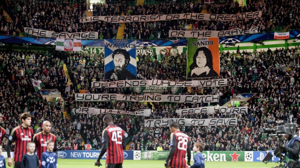 Celtic supporters display banners ahead of the the Uefa Champions League Goup H match against AC Milan at Celtic Park. Photograph: Brian Stewart/EPA