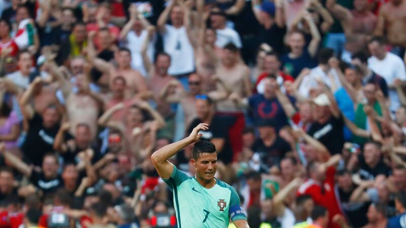 Portugal’s Cristiano Ronaldo reacts after Hungary’s Balazs Dzsudzsak scores their third goal. Photo: Kai Pfaffenbach/Reuters