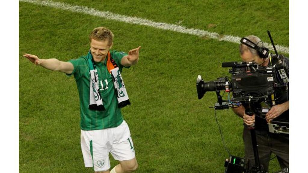 Damien Duff celebrates after the final whistle. Photograph: James Crombie/Inpho