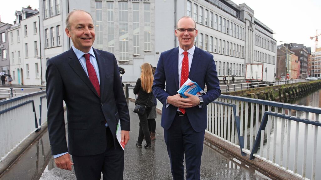 Tánaiste Simon Coveney and leader of Fianna Fáil Micheál Martin as they both canvassed in Cork city on Monday morning. Photograph: Diane Cusack