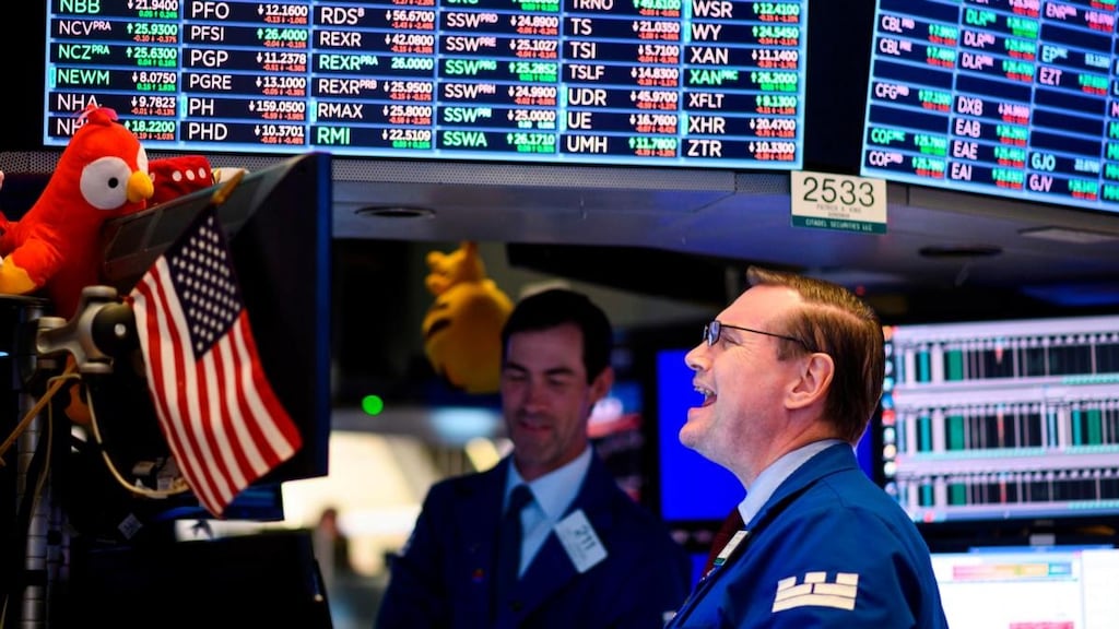 Traders work at the New York Stock Exchange. Photograph: Johannes Eisele/AFP/Getty Images