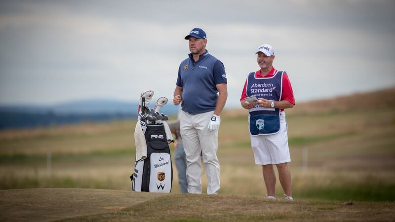 Lee Westwood waits to play his approach into the 18th green. Photo: Kenny Smith/PA Wire