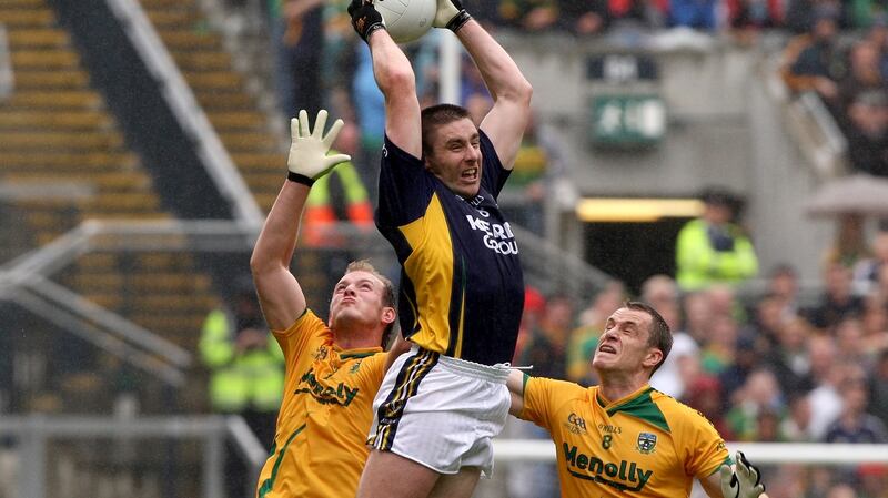 Kerry’s Darragh O’Se fetches the ball over Meath’s Joe Sheridan and Nigel Crawford. Photograph: James Crombie