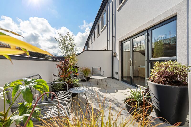 Generous, paved patio space to the rear