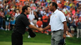 Woods earns winning point as United States claim eighth Presidents Cup victory