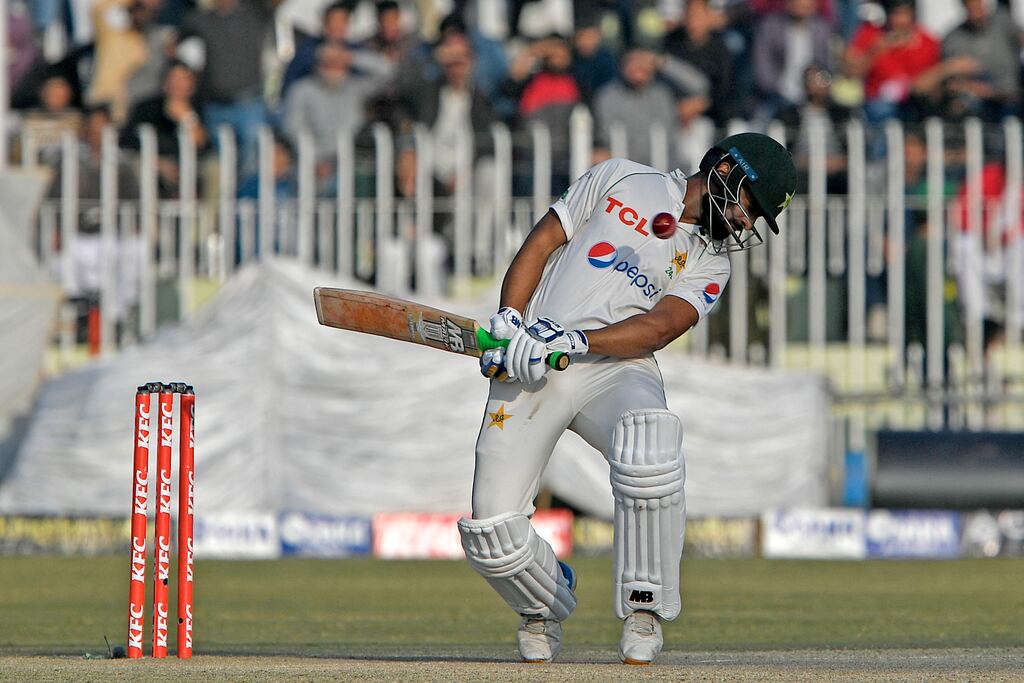 Pakistan's Abdullah Shafique avoids a bouncer during the fourth day of the first Test against England at the Rawalpindi Cricket Stadium. Photograph: Aamir Qureshi/AFP via Getty Images