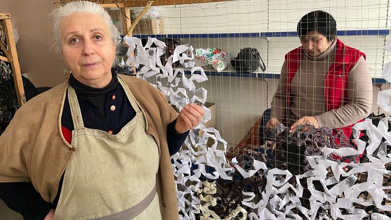 Nadezhda Kalinchenkova (left) and Tatyana Miroshnichenko, volunteers in Kramatorsk who make camouflage nets, clothing and other items for Ukrainian troops fighting Russian-led separatists in nearby areas of the Donbas region. Photograph: Daniel McLaughlin
