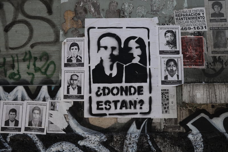 Posters in Guatemala City seek answers to what happened to the mostly indigenous Mayan victims during the civil war. Photograph: Hannah McCarthy