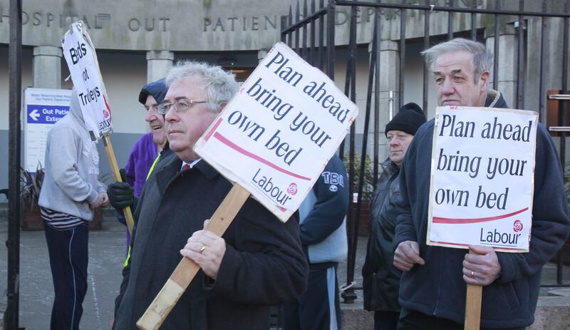 Senator Joe Costello protests outside the Emergency Department of the Mater hospital, Dublin, during 2011 in a demonstration organised by the Labour Party highlighting numbers of patients on trolleys. File photograph: Brenda Fitzsimons/The Irish Times