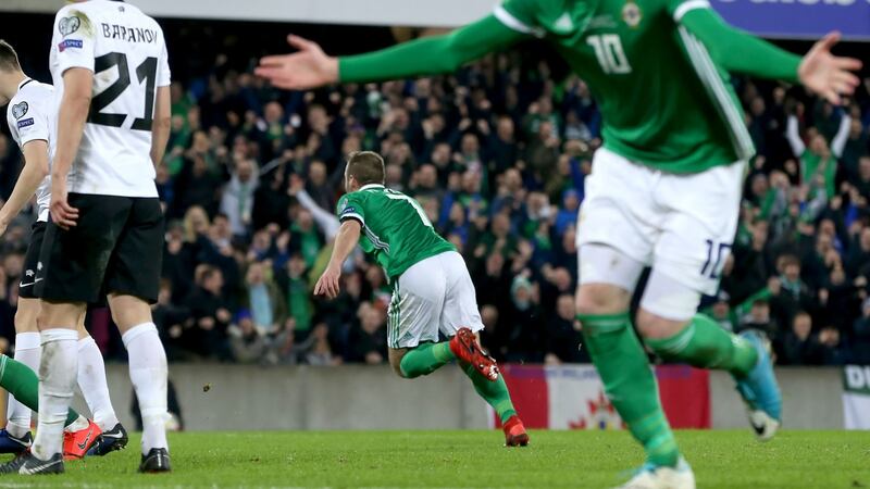 Niall McGinn celebrates scoring Northern Ireland’s opener at Windsor Park. Photograph: William Cherry/Presseye/Inpho