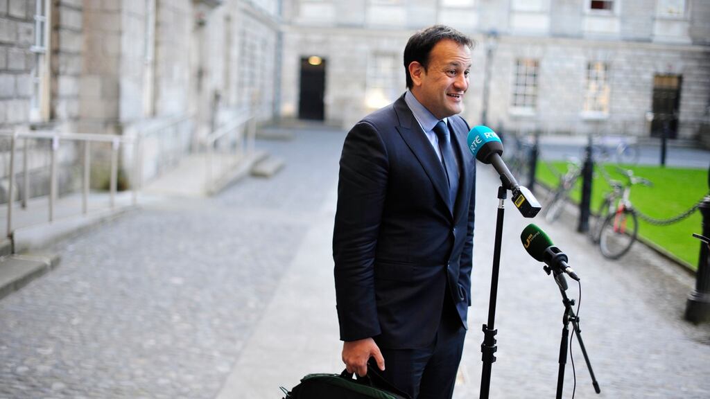 Leo Varadkar talks to the media in Trinity College after leaving talks yesterday: the outlines of a compromise were agreed. Photograph: Aidan Crawley