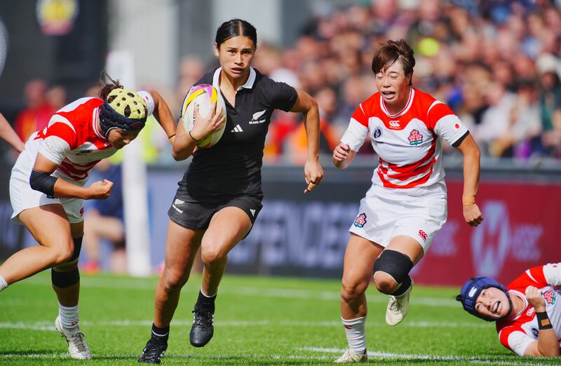New Zealand's Braxton Sorensen-McGee (centre) runs in to score one of her three tries against Japan in Sunday's World Cup pool match. Photograph: Ben Birchall/PA Wire