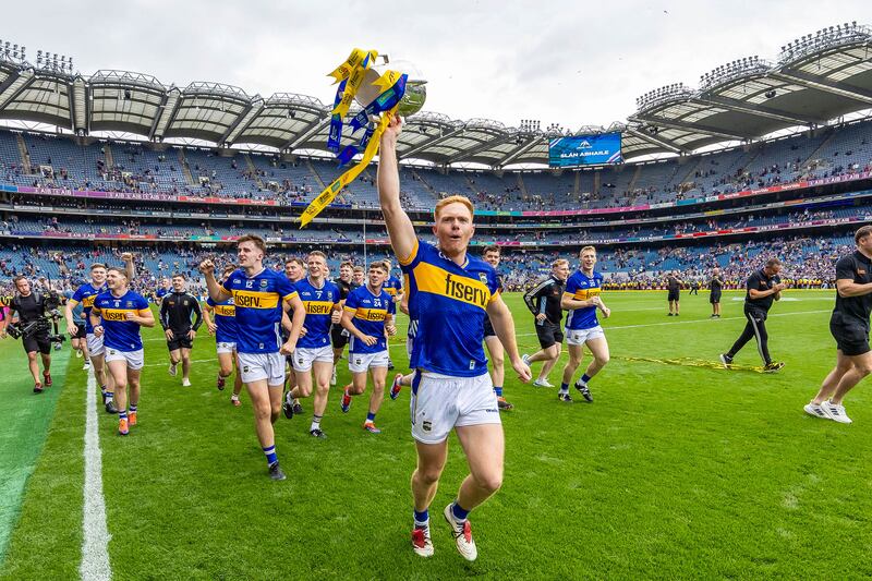 Jason Forde celebrates with the Liam MacCarthy cup after Tipperary's win over Cork. Photograph: Morgan Treacy/Inpho
