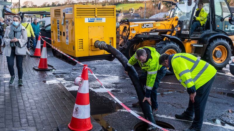 Cork County Council employees were preparing pumps in Bantry this evening for expected flooding due to Storm Barra. Photograph: Andy Gibson
