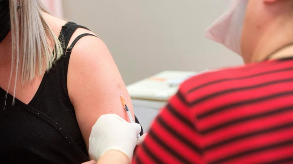A volunteer is injected with a syringe containing either the vaccine or a placebo, at the start of a clinical trial being set up by TASK, a clinical research organisation based in Cape Town, to see whether the Bacillus Calmette-Guerin (BCG) vaccine, which is given to babies in the country to protect them against tuberculosis, helps limit the damage caused by Covid-19. Photograph: Rodger Bosch/AFP/Getty