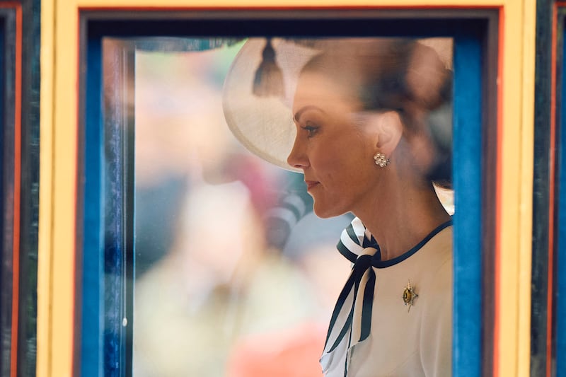 Kate Middleton rides the Glass State Coach during the King's birthday parade. Photograph: Benjamin Cremal/AFP/Getty Images