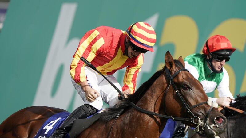Tom Marquand celebrates Galileo Chrome’s St Leger victory. Photograph: Alan Crowhurst/Getty