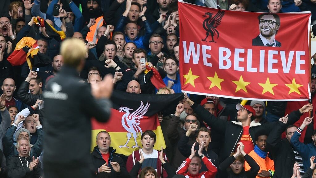Liverpool manager Jurgen Klopp appaluds fans after the game. Photograph: Dylan Martinez/Reuters