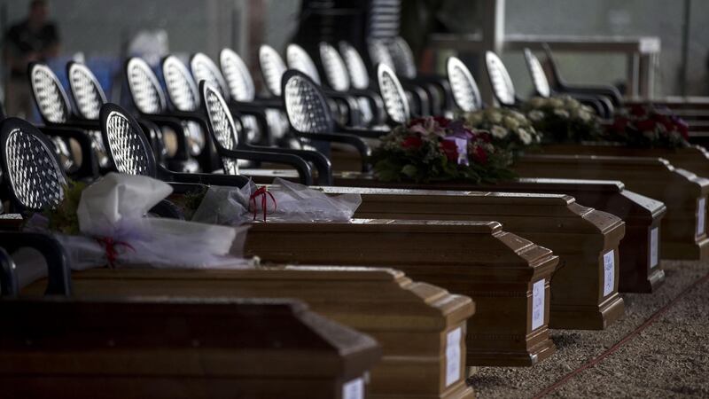 Some of the coffins in a tent for the funeral of victims in Amatrice. The devastating August 24th earthquake in central Italy has left so far a total of 292 dead. Photograph: Massimo Percossi/EPA