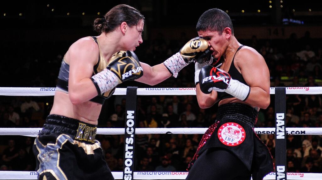 Katie Taylor in action against Cindy Serrano in her WBA & IBF female lightweight world title defence. Photograph:    Emily Harney/Inpho