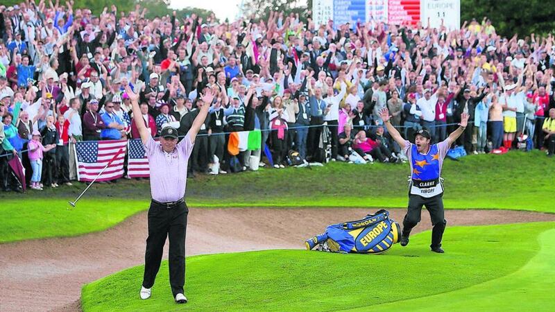 Darren Clarke celebrates after making a 110 ft putt on the 12th green as he plays against Zach Johnson of the United States in the singles session on the third and final day of the 2006 Ryder Cup at the K Club in Straffan, Co Kildare. Photograph: Adrian Dennis/AFP/Getty Images