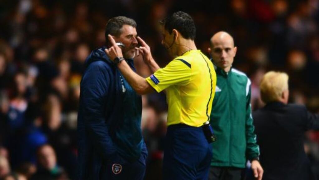 Referee Milorad Mazic speaks to Roy Keane, assistant manager of the Republic of Ireland, during the EURO 2016 Group D qualifier at Celtic Park. Photograph: Mark Runnacles/Getty Images