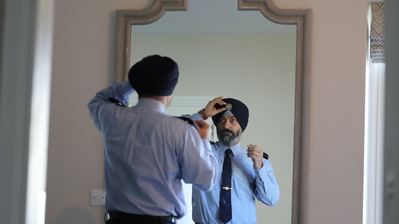 Ravinder Singh Oberoi in his Garda turban: Measures have been taken to encourage minority recruitment, including a change to the Garda uniform policy to allow members wear religious headgear such as hijabs or turbans. Photograph Nick Bradshaw