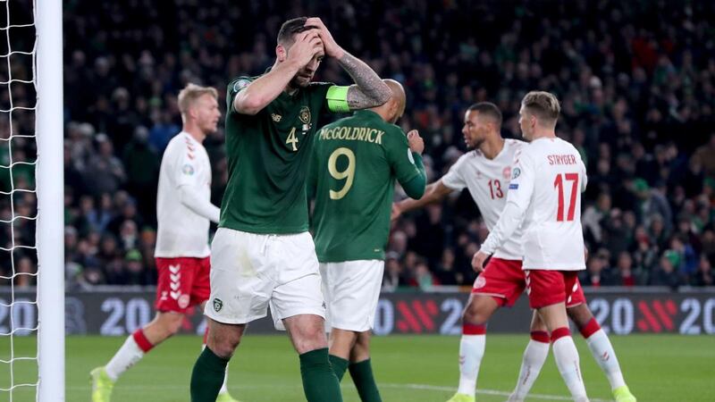 Shane Duffy reacts after missing a chance against Denmark. Photograph: Niall Carson/PA