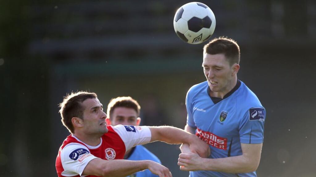 UCD’s James Kavanagh battles with Christy Fagan of St Patrick’s Athletic during the Premier Division clash at the UCD Bowl. Photo: Ryan Byrne/Inpho