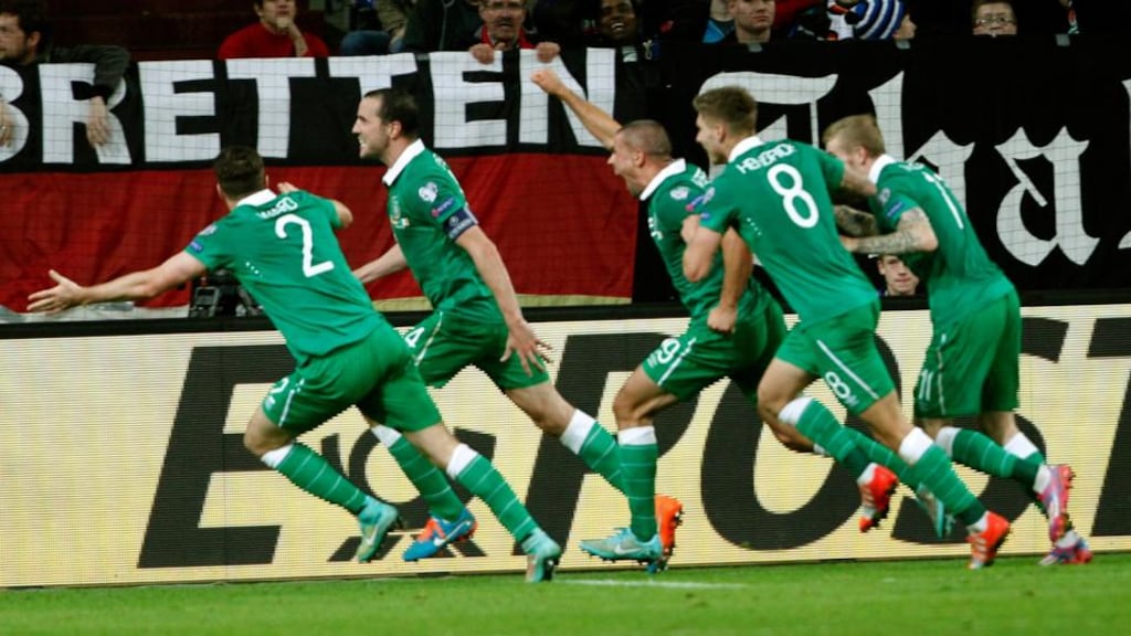 John O’Shea races away in celebration with his teammates after scoring the Republic of Ireland’s equaliser at Arena Auf Schalke in Gelsenkirchen, Germany. Photograph: EPA