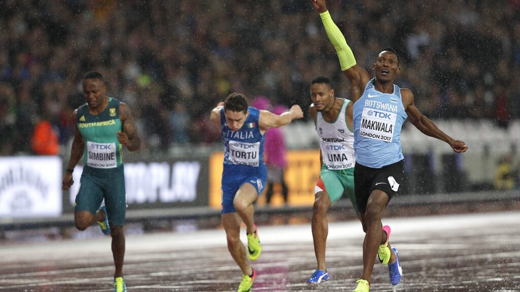 Isaac Makwala celebrates his second place finish in his 200m semi-final in London. Photograph: Adrian Dennis/AFP