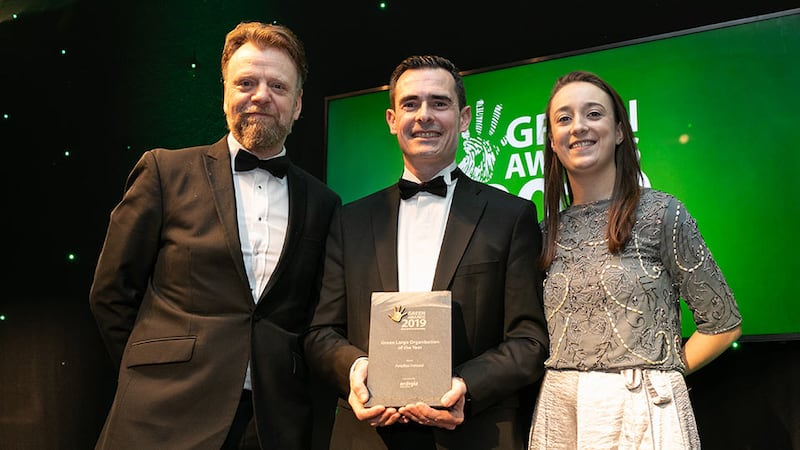 Cormac Mannion, Manager Energy Services, Energia presents the Green Large Organisation of the Year award to Colm Timmons & Megan Staunton, Astellas Ireland.