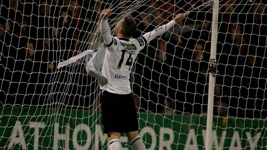 Dane Massey celebrates David McMillan’s opening goal for Dundalk against Bohemians at Dalymount Park last night. Photograph: Donall Farmer/Iinpho
