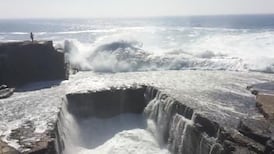 Couple hailed as heroes after rescuing student swept off cliff