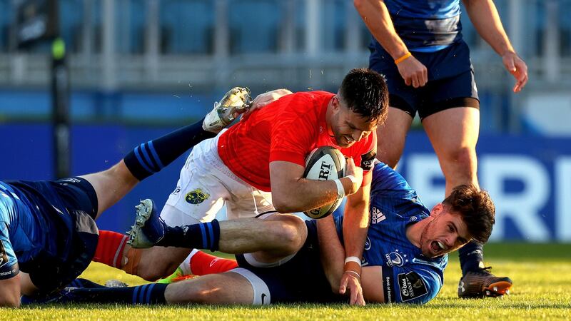Conor Murray scores a try during Munster’s win over Leinster. Photograph: Ryan Byrne/Inpho
