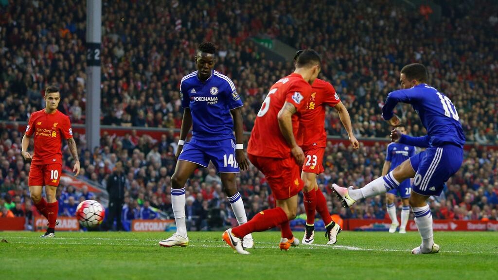 Eden Hazard scores the first goal for Chelsea in the Premier League game against Liverpool at Anfield. Photograph: Andrew Yates/Reuters/Livepic