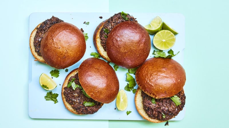 Chipotle mushroom & black bean burgers with peanuts and lime. Photograph: David Loftus