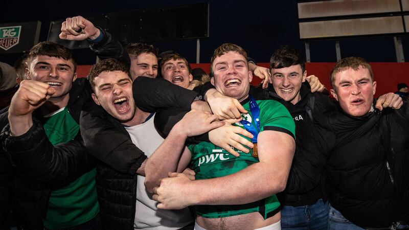 Ireland's Jack Boyle celebrates after the game with his friends. Photo: Ben Brady/Inpho